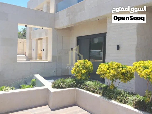 فيلا متلاصقة من اربع طوابق و روف خلف تاج مول في عبدون / ref 1374