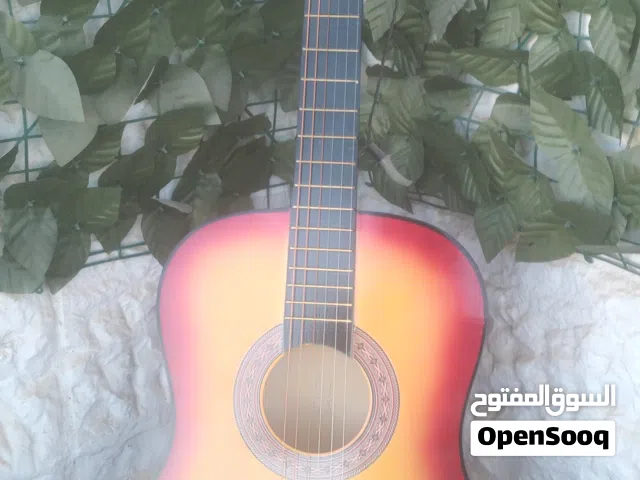 جيتار كلاسيك للبيع مع شنته و وريشه