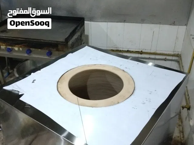tandor gas . kitchen hood work table