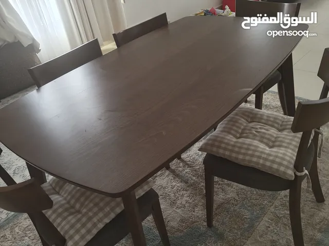 Danube Dining Table Coffee brown colour in good condition