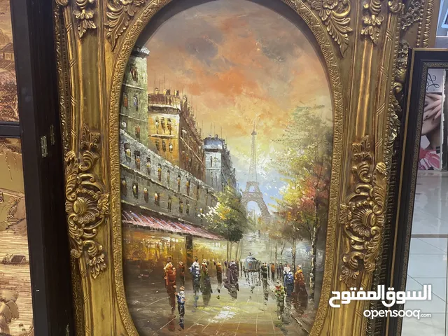لوحة رسم يدوي مع اطار ذهبي