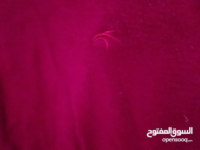 بلوزات وقمصلة