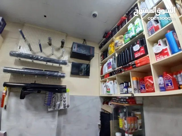 مغسلة سيارات للبيع عجمان روضة 2  3 أبواب وامكانية اضافة باب رابع  جك وزينة سيارات مخفي تبديل زيوت وب