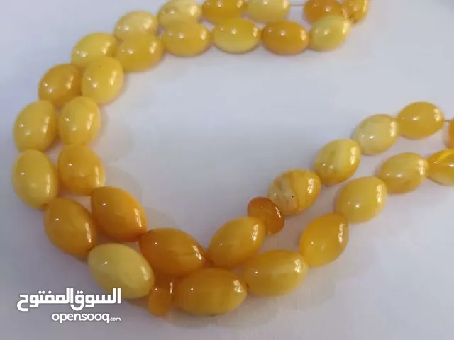 سبحة كهرب حجر لون اصفر