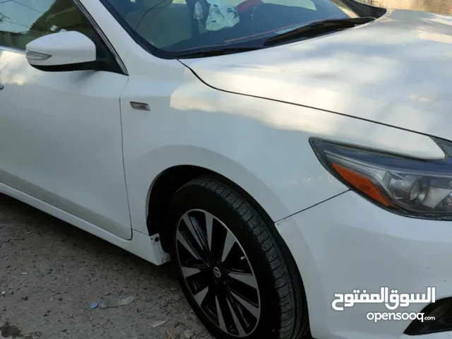 نيسان التيما 18ابيض وارد كندي