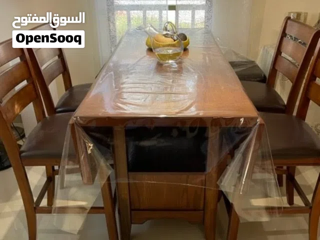 Dinning Room with 4 leather chairs & Bench for Sale (purchased from Home Center)