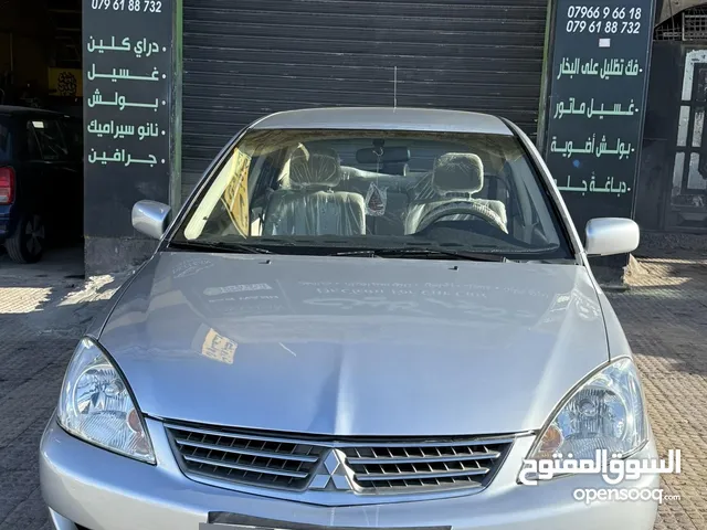 لانسر للبيع اقساط شخصي لون سلفر مميز 1.6 اصلي