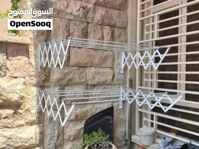 منشر غسيل جداري ستانلس ستيل قابل للطي يركب على جهه واحده داخل البيت او خارجه
