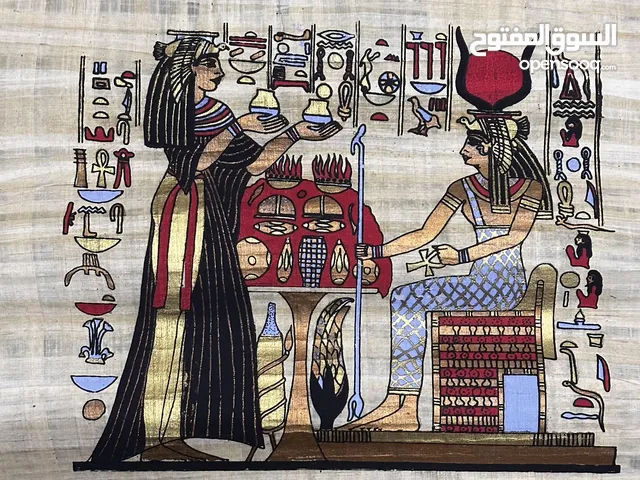 لوحات قديمة بتصميم فرعوني على ورق البردي رسم يدوي