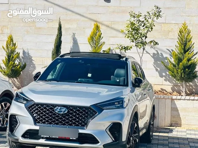 هيونداي توسان (N-Line) 2021 فُل أوبشن للبيع، لون فضي مُميز ، حالة وكالة ، ماشي 50000 ترخيص وتأمين.