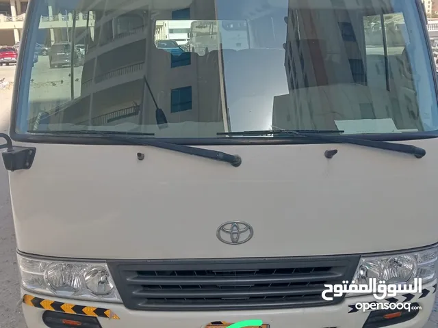 Toyota Coaster 2009 white colour