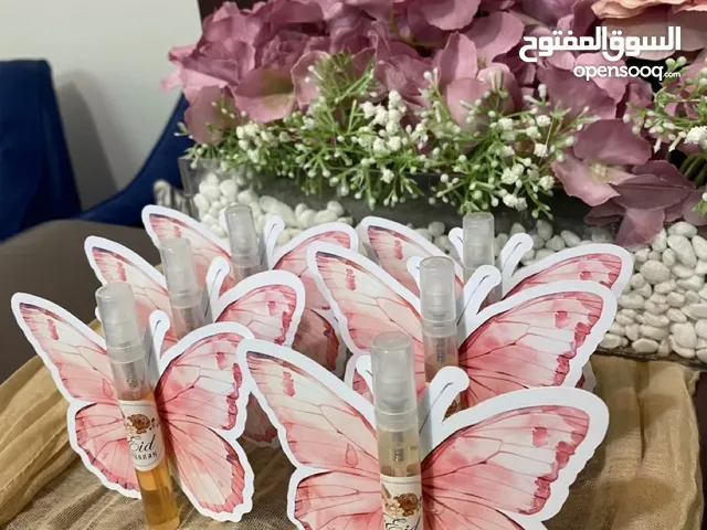 توزيعات للعيد شموع معطره باشكال جذابه وعطور بثيم فراشه
