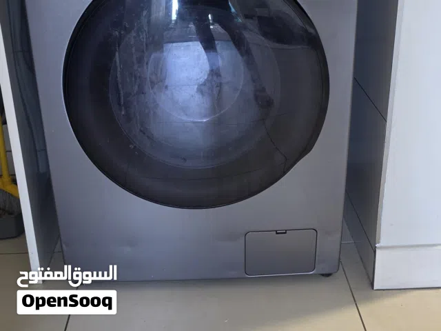 A Samsung washing machine with dryer غسالة سامسونج بمجفف