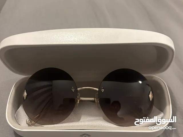 Swarovski Women’s circular Sunglasses for sale.