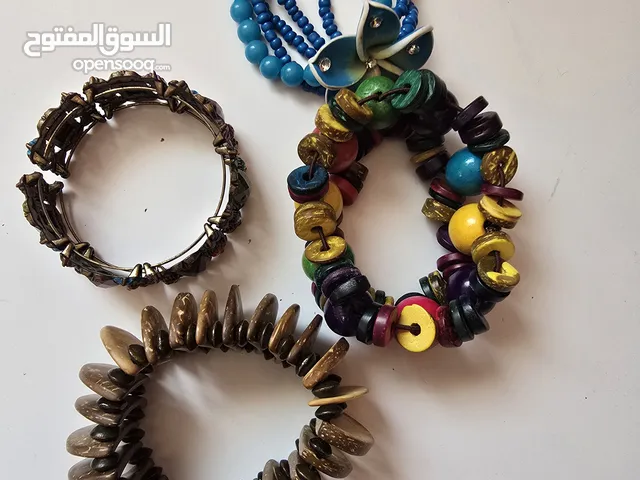 أساور خشب وواحدة حديد (بني أزرق ملون)