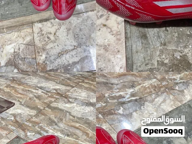 Adidas athletic playing shoes