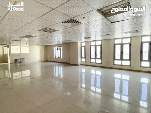 Prime Mezzanine Shop with Road View in Wadi Kabir - Your Business's New Address!"