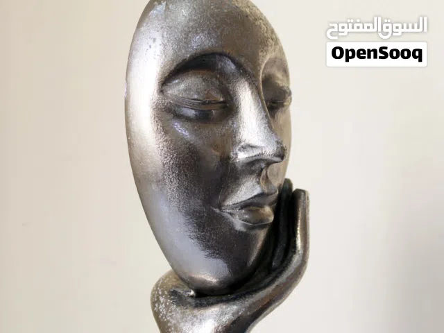 تمثال وجه مفكر ( Thinking face ) . ألومنيوم