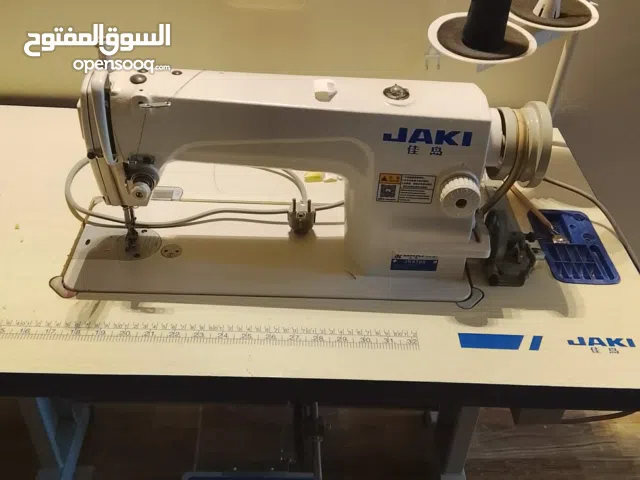 ماكينة خياطة صناعية و أوفر صناعية