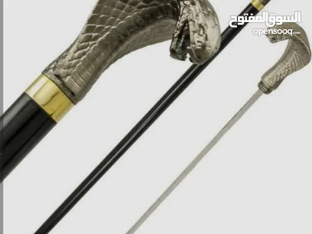 عكاز برأس كوبرا معدني