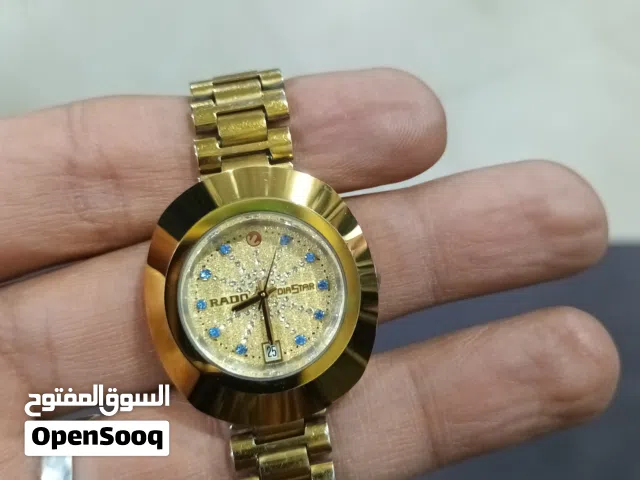 رادو نسائي تومتيك ذهبي