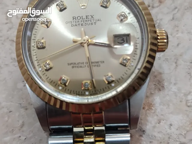 ساعه روليكس اوتوماتيك ودقيقه جدا بالوقت صناعه السويسري 100% نص ذهب مألمسه شهري بحاله الجديد