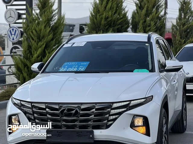 هونداي توسان هايبرد ترخيص 2022 بنزين وكهرباء