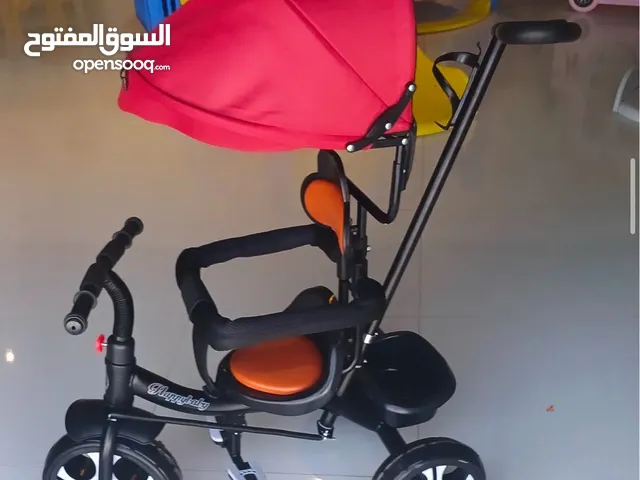 عربة للاطفال على شكل دراج ممتازة جداً