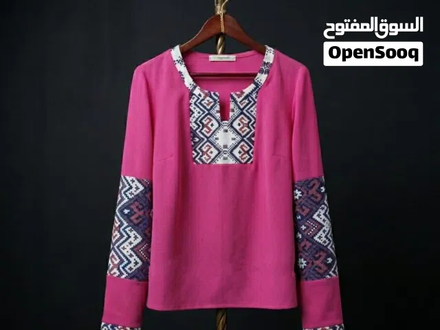 تراكات نسائيه وقمصان