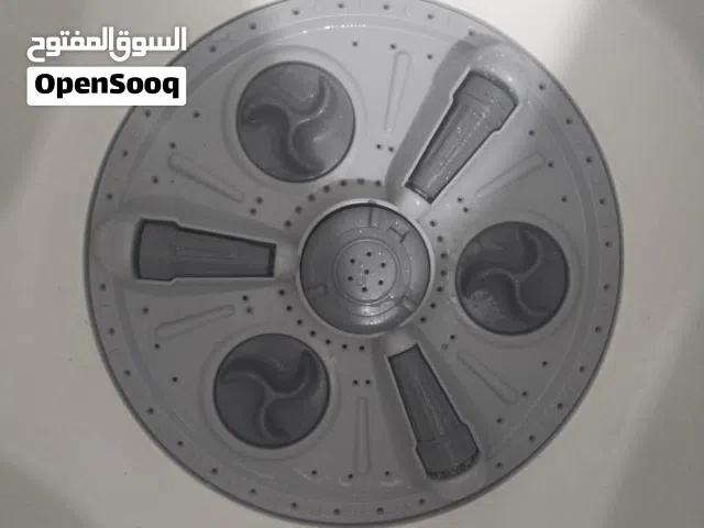 غساله ملابس وثلاجه