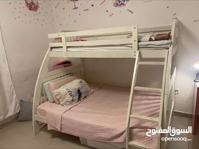 Bunk bed with mattresses