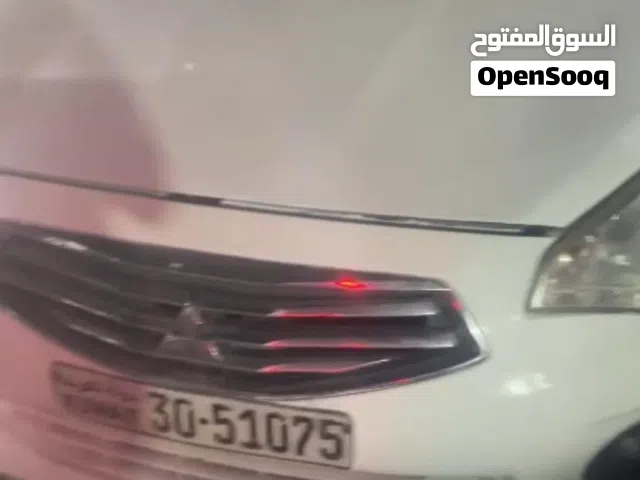 2015 ميتسوبيشي اتراج GLX