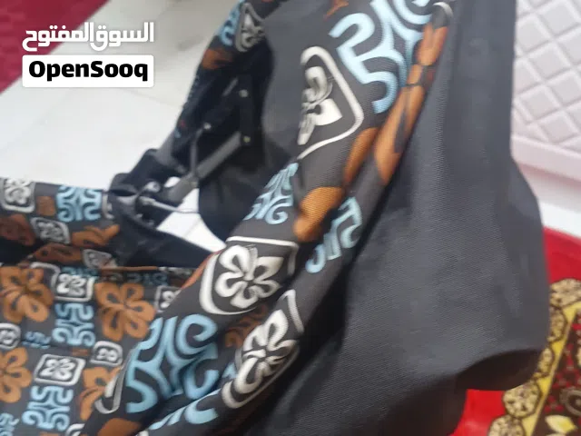 عربة أطفال كبيرة الحجم