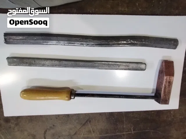 كاوي لحام قصدير (مطرقة) وسبيكة قصدير وواحدة رصاص