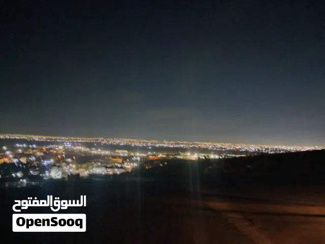 أرض مميزة على مطل الحاتمية