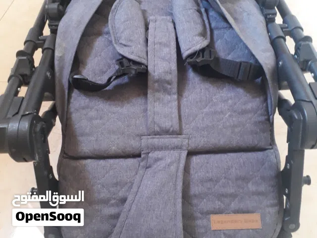 عربة أطفال جديدة
