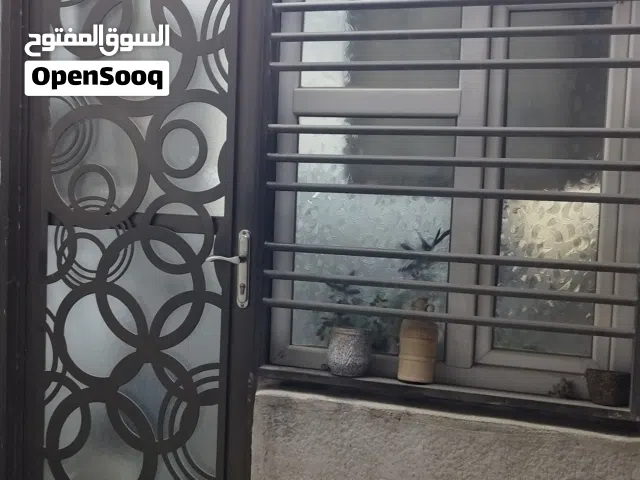 ابواب حديد وشبابيك حديد والمنيوم