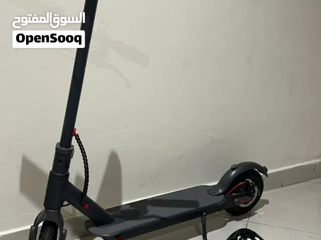 Electric Scooter with Helmet and Charger, Long range, Slightly Negotiable