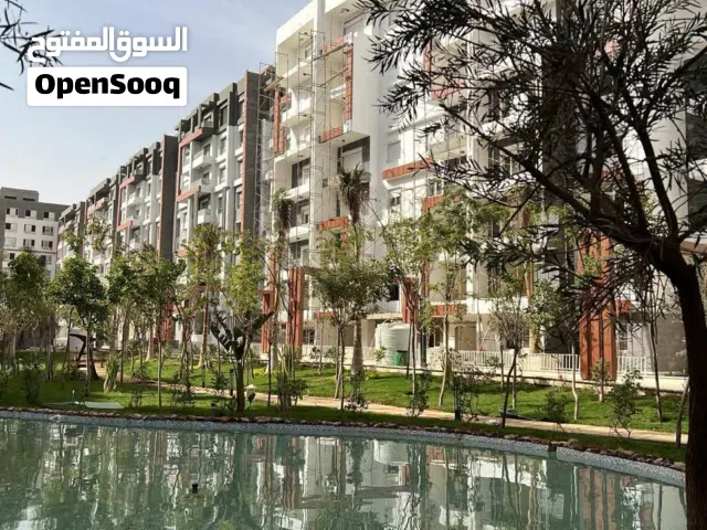 هتيجي بشنتطك وتاخد شقتك شقتك استلام فوري متشطبه بالكامل في العاصمه الاداريه  امام البرج الايقوني