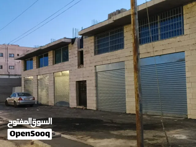 مخازن للايجار في خريبة السوق بناء جديد قريب من السوق المركزي
