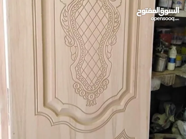 نجار أبواب وشراشيب وصيانه كل أنواع النجاره وعمل ديكورات ويجار وتركيب قواطع جبسامبورد وباركيه