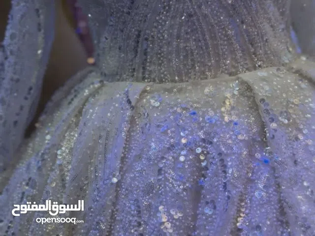 فساتين عرايس يوجد كميات تصفيهً محل