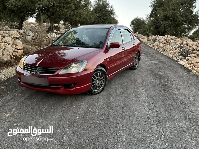 ميتسوبيشي لانسر رالي آرت اصلي، موديل 2007، فل الفل مع الفتحة ، محرك 2000 سي سي قوي جداً واقتصادي