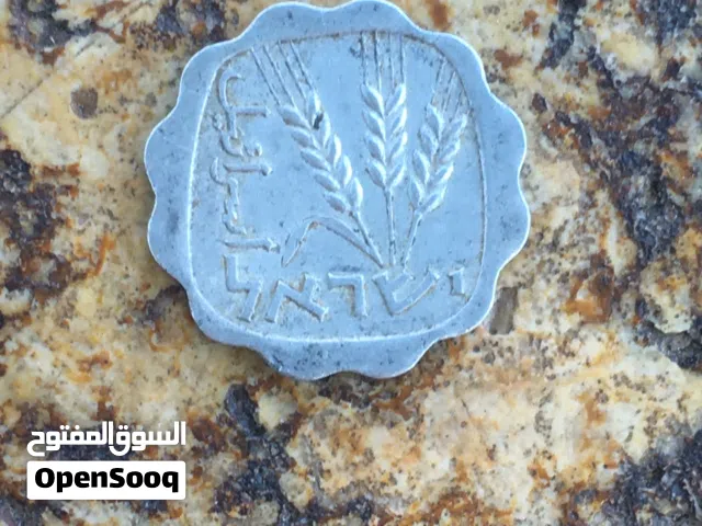1984  فلس  اردني يوجد اجورة علامة السنابل الثلاثة من زمن مدينة بابل سعر5000 دينار فقط