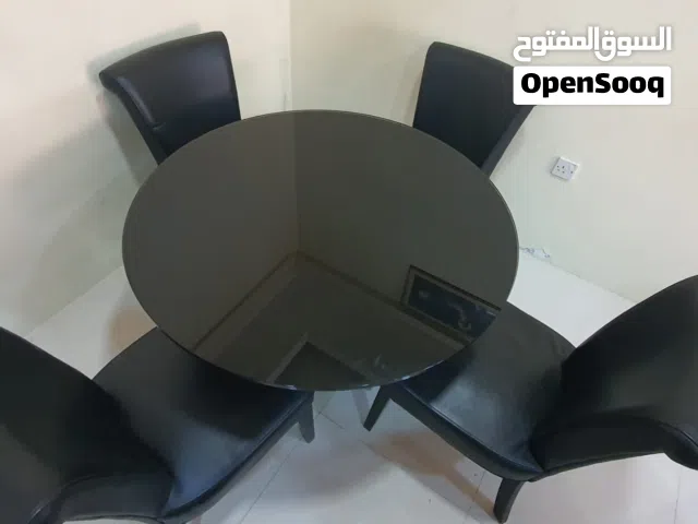 MODERN GLASS ROUND TABLE + 4 CHAIRS URGENT SALE 35 BHD ONLY