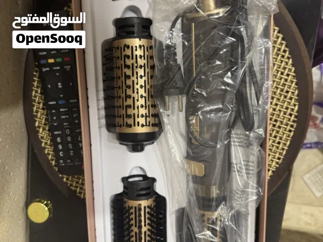 فرشاة شعر كهربائي