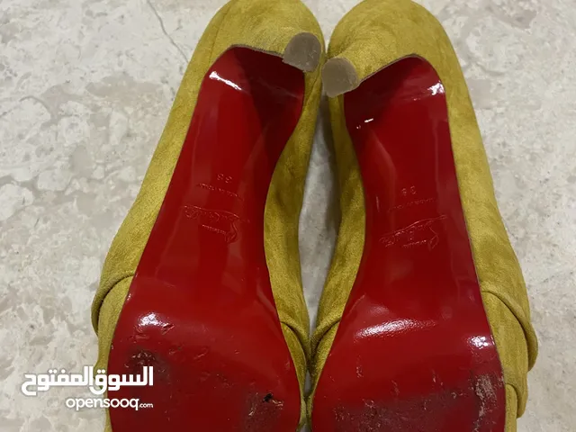 CHRISTIAN LOUBOUTIN