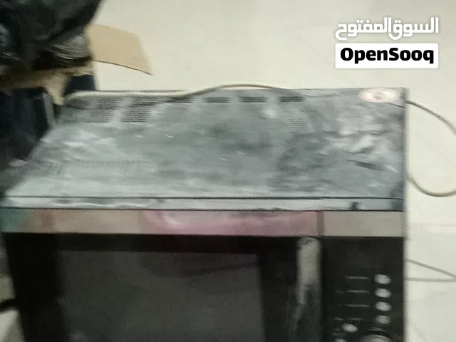 ميكرويف مستعمل اللون اسود