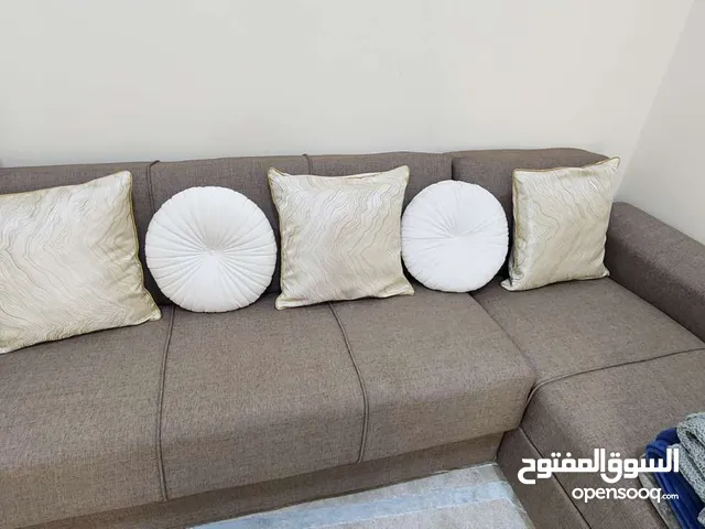 L shaped sofa convertable to bed with storage كنب زاوية متحول لسرير مع مساحة تخزين