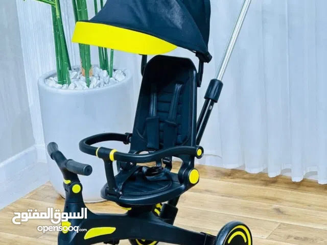 عربية الأطفال المميزة  مع يد التحكم في القيادة و شمسية لحماية الطفل من أشعة الشمس  باللون المميز جدا